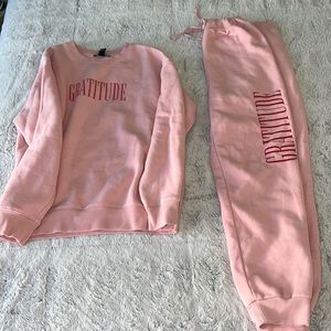 Pink matching sweat shirt/pants pink. Size M